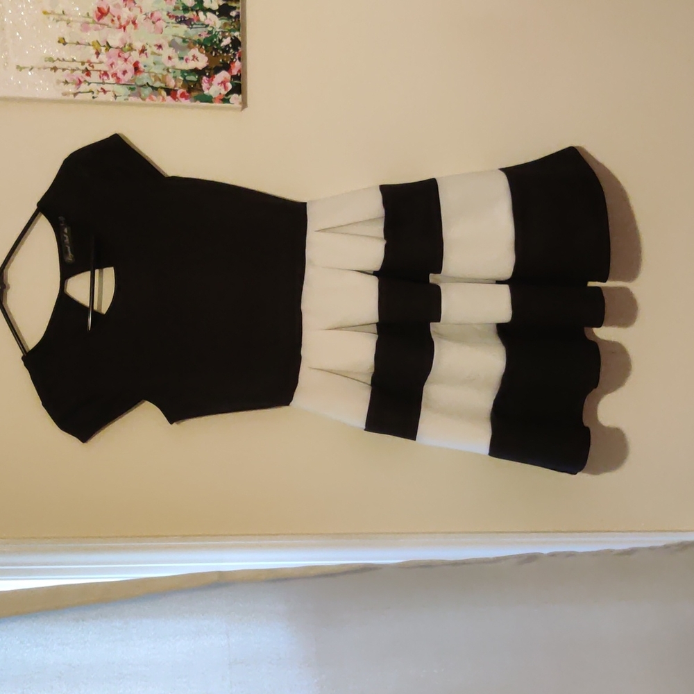 Grystal dall black and white dress